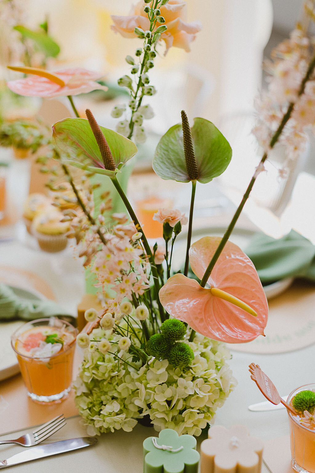 The talented Flower District created fabulous floral arrangements that lined the table. We were thrilled to learn she uses environmentally friendly methods, making the event completely foam-free!